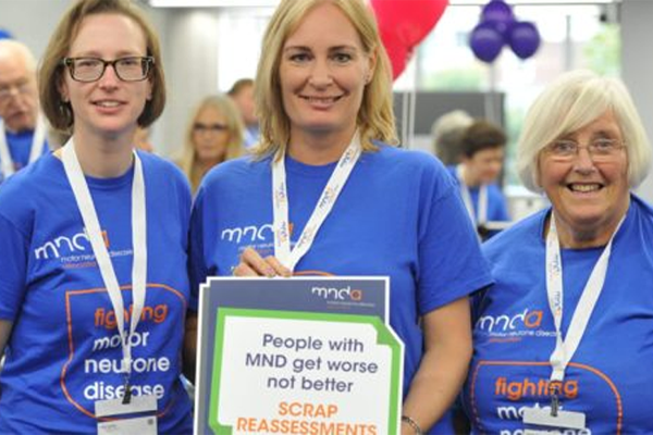 Photo of three people who work for the MND Association