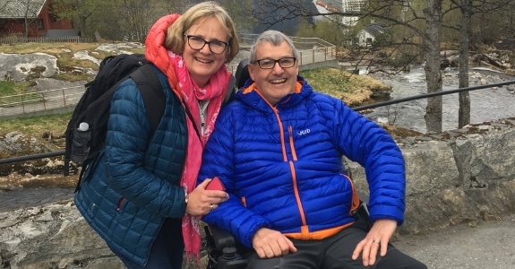 Supporter Margaret stood next to her late husband, John, who's sat in a wheelchair, during a hike