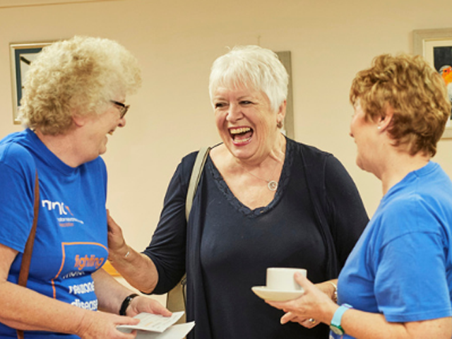 people attending a MNDA group meeting 