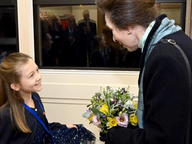 HRH Princess Anne meeting child 