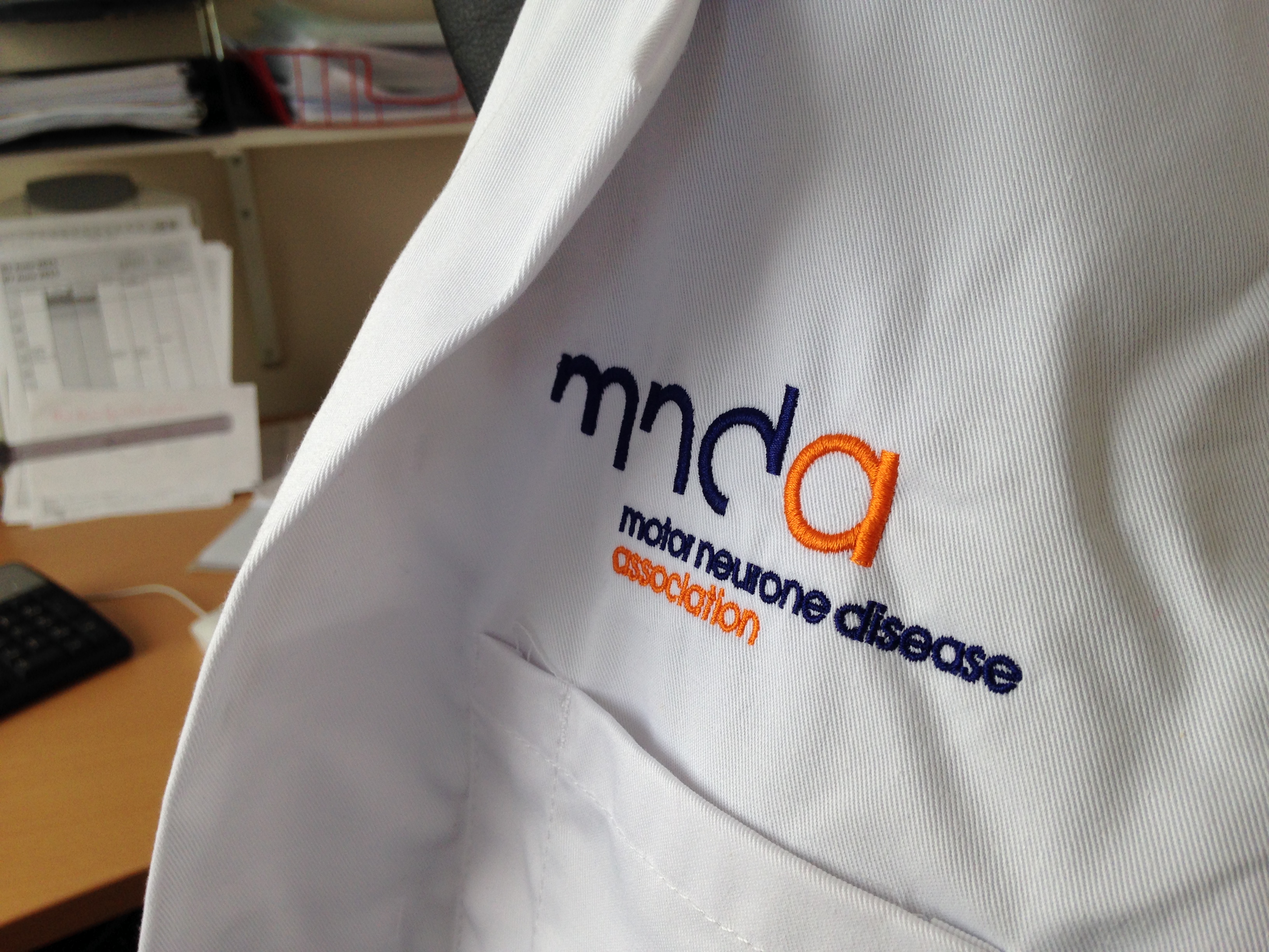 MND Association branded lab coat