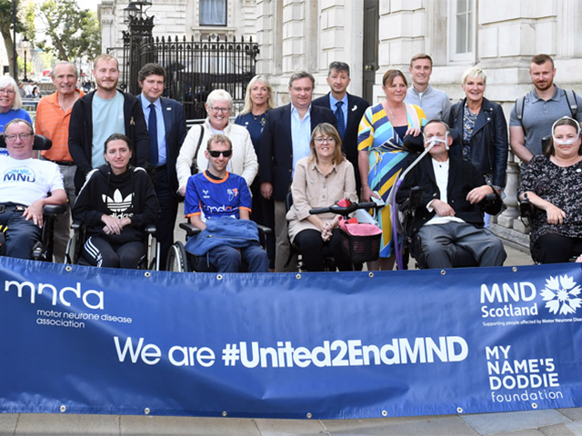 United2EndMND group of people outside downing street