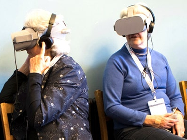 photo of people wearing virtual reality headsets
