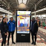 Team Johnrose and an MND campaign poster