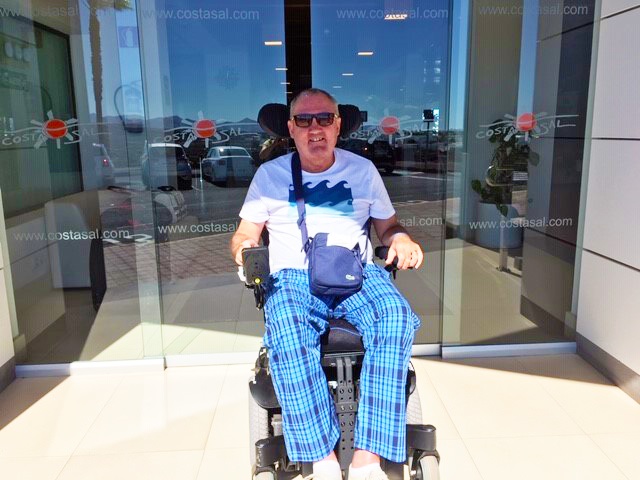 Ian Lev in a wheelchair