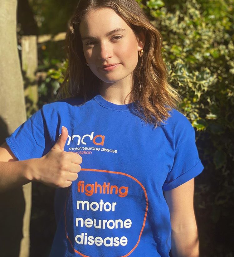 Lily James wearing an MND Fundraising t-shirt