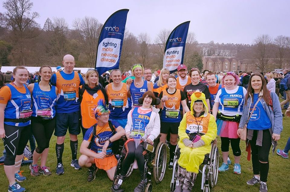 a group of people completing brighton marathon
