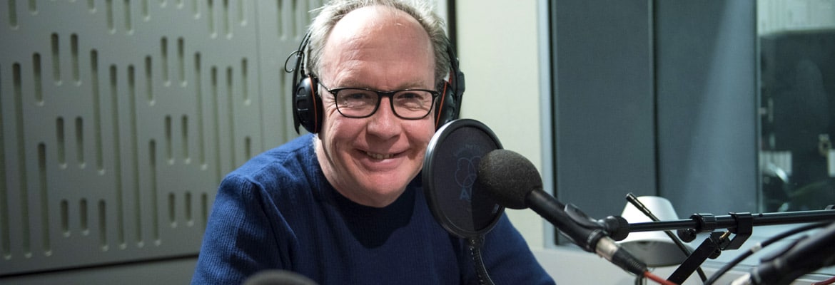 Matthew Bannister in a Radio booth