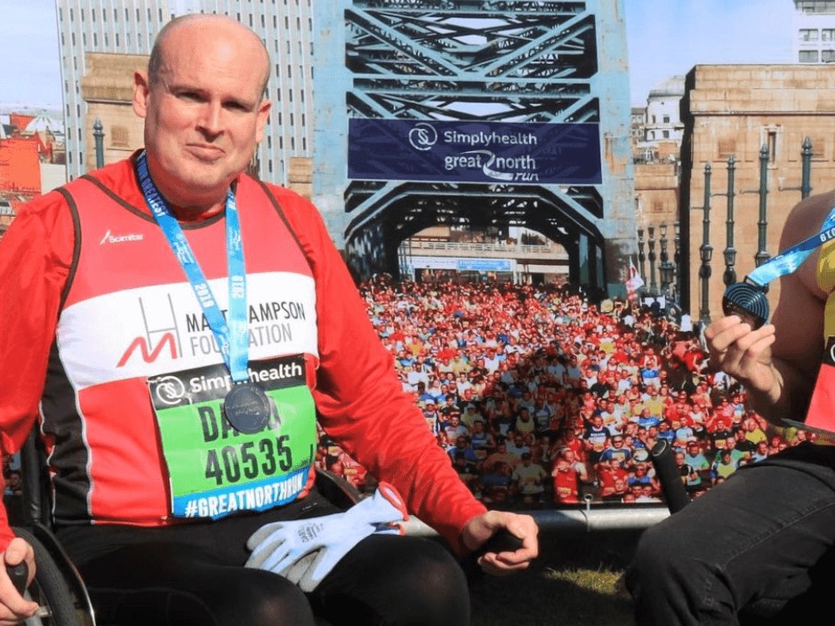 David after completing Great North Run in a wheelchair