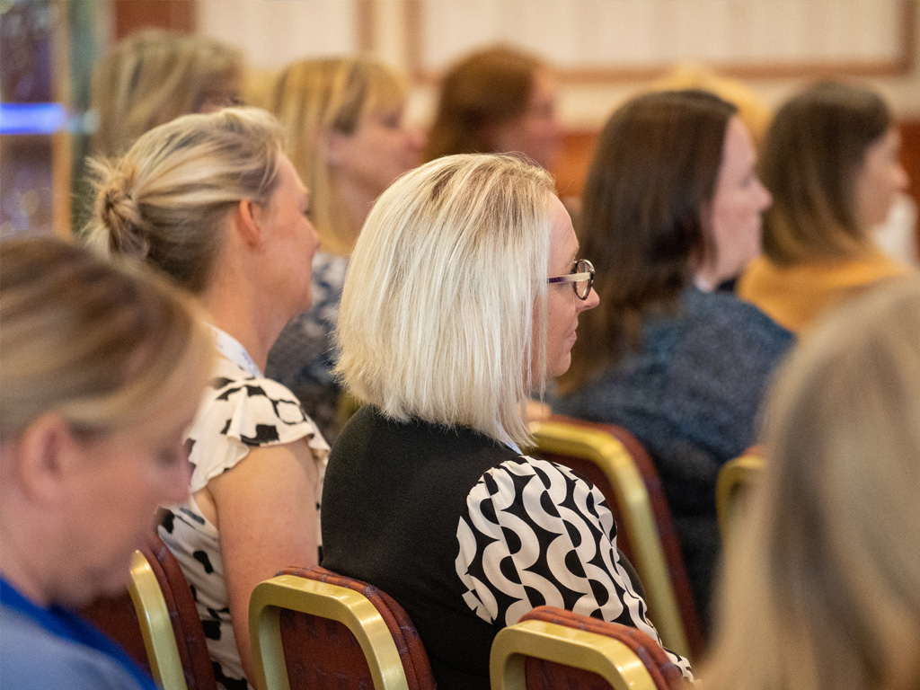 A group of professionals at a training event