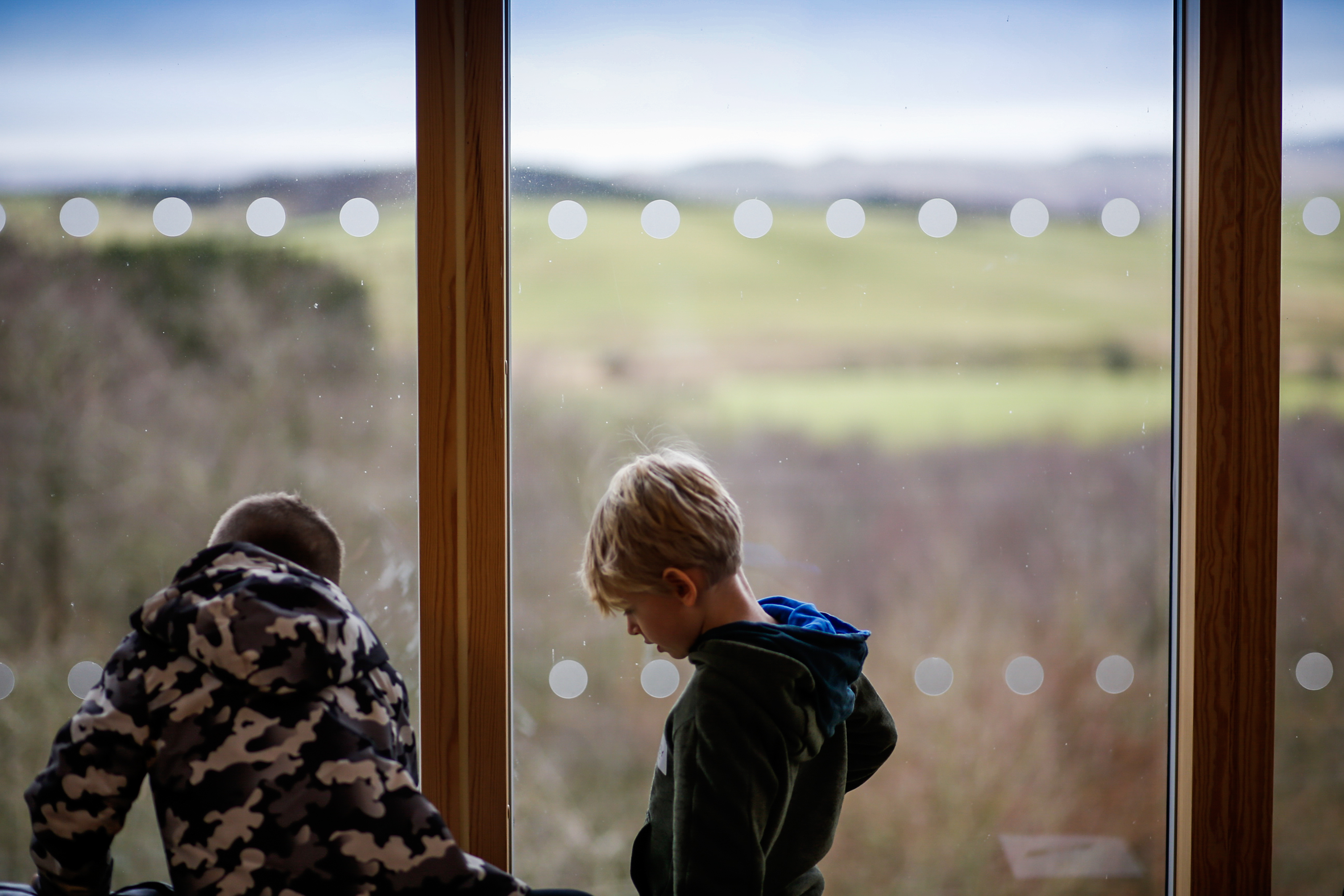 Children in front of a window