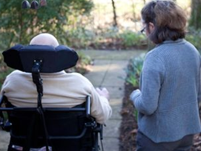 two people walking outside