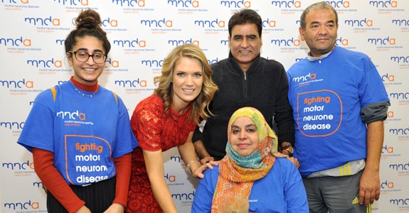 a photo of charlotte hawkins with a family effected by MND.
