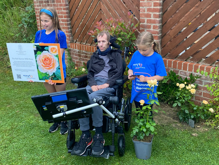 Rob Burrow and children plant the Rob Burrow MND Rose