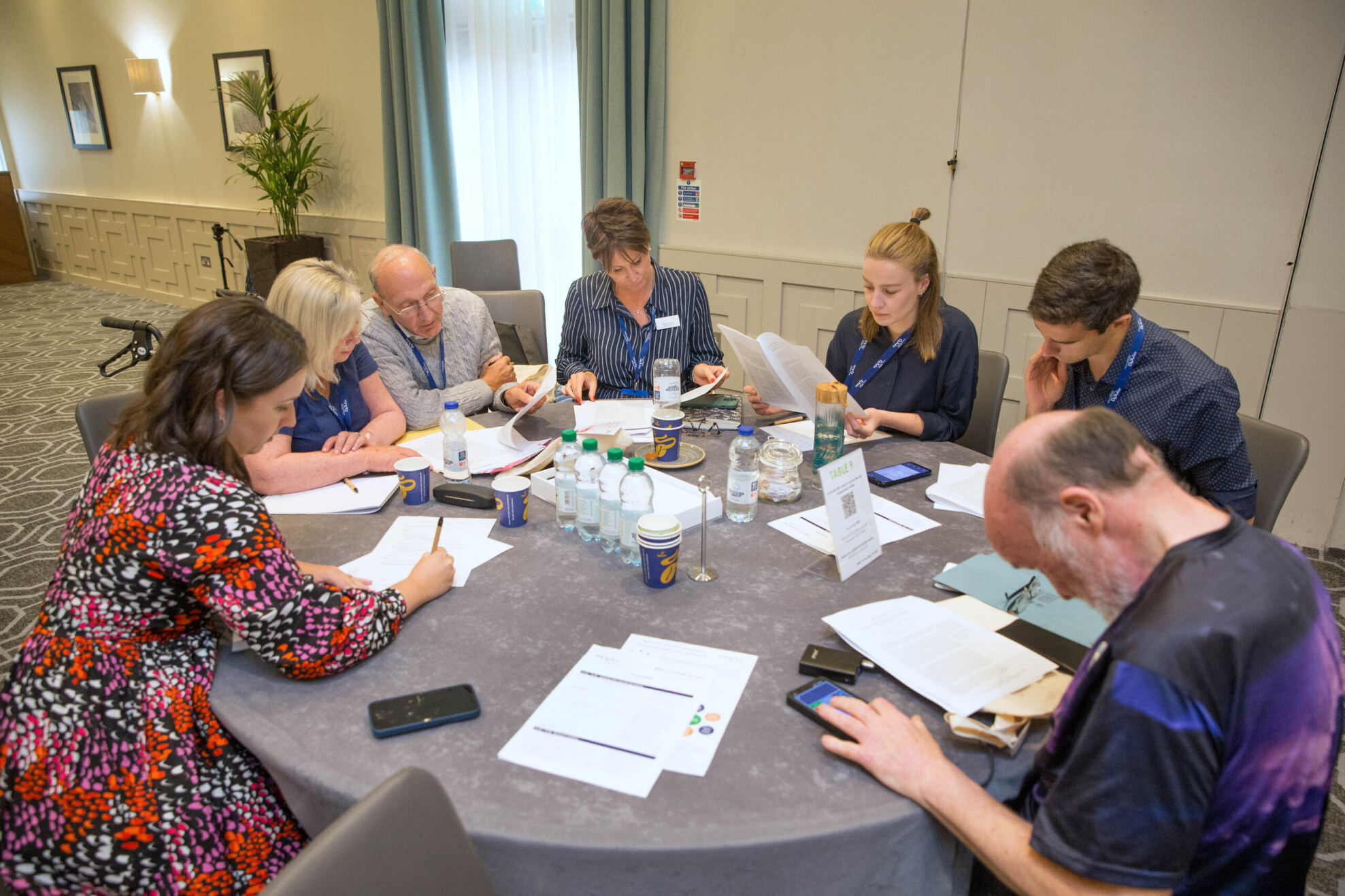 people working at table