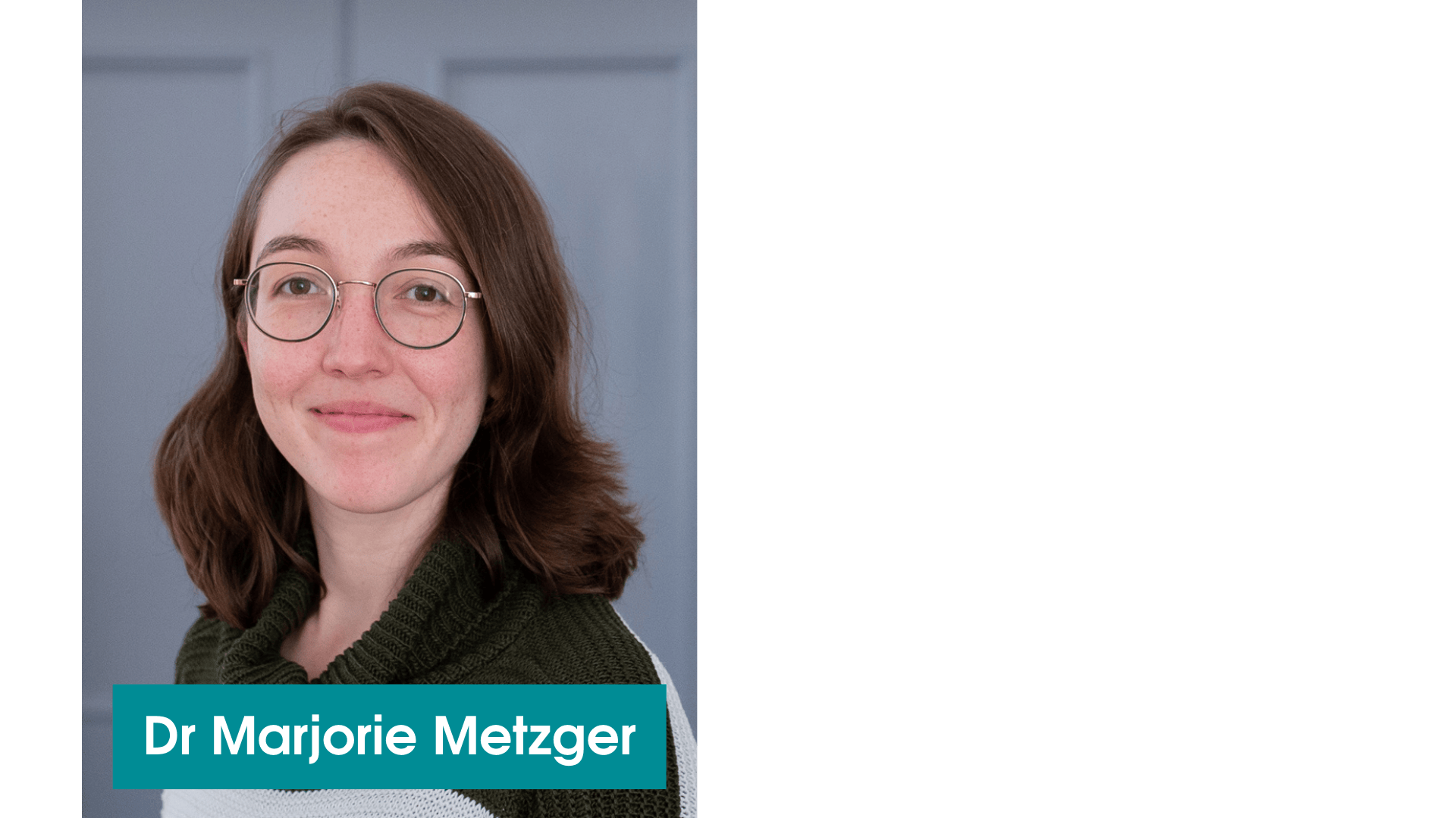 Dr Marjorie Metzger, wearing a black and white top and glasses. She is smiling at the camera.