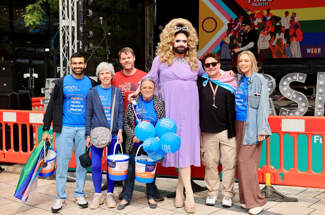 Volunteers celebrating Pride 10k walk