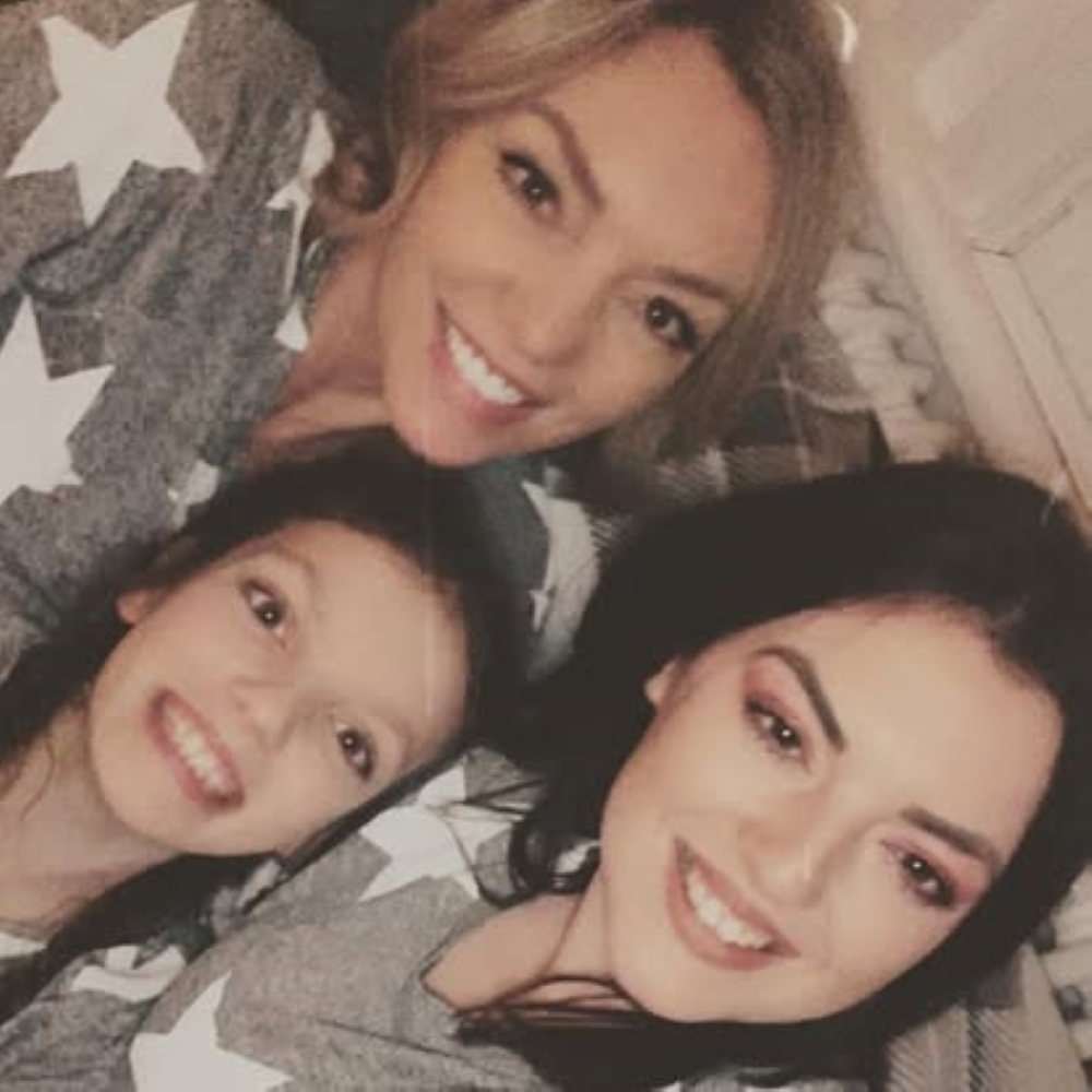 Zoe pictured with her daughters