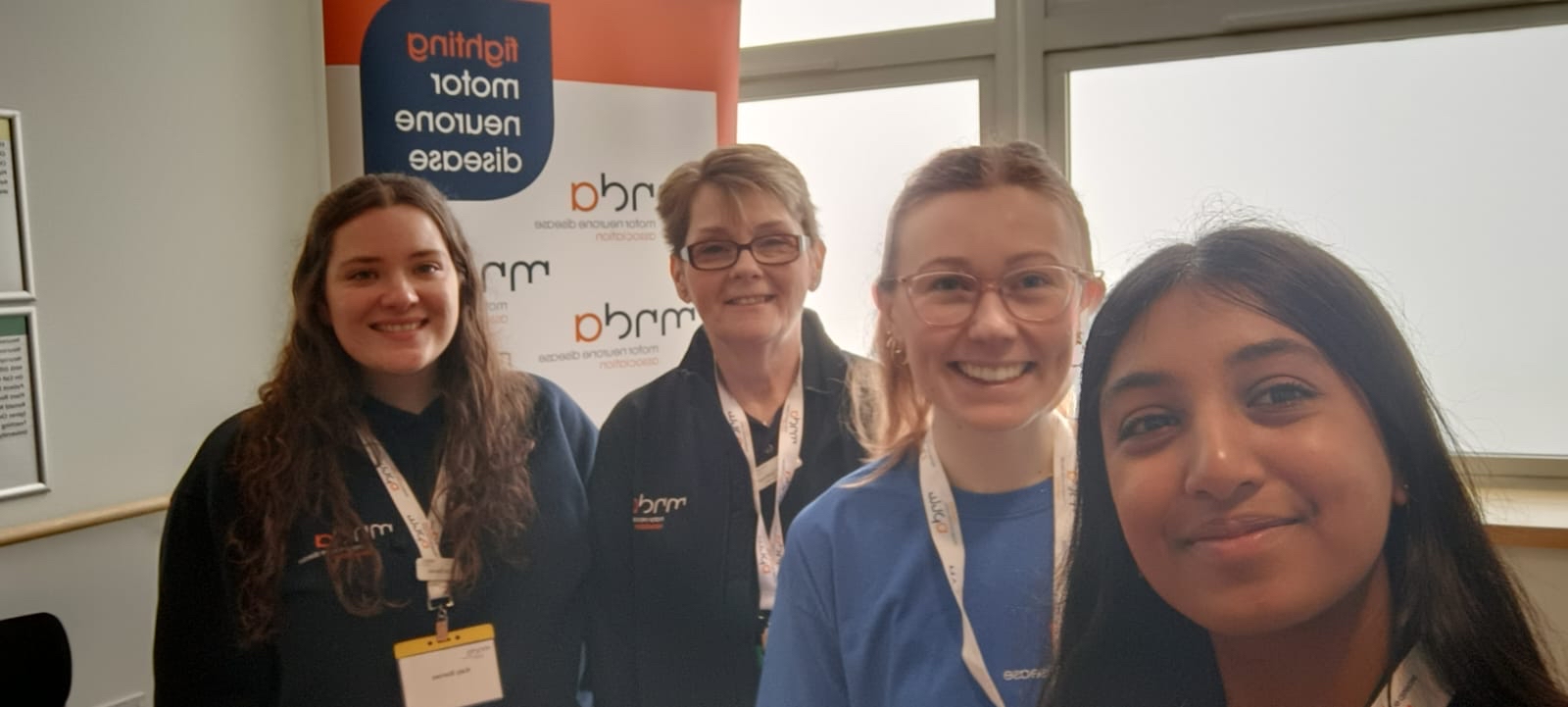 Some of the research team smiling at the camera. 