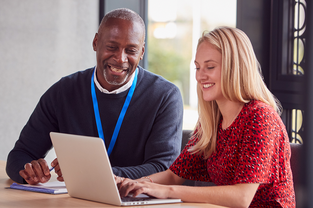 A tutor talking to a student