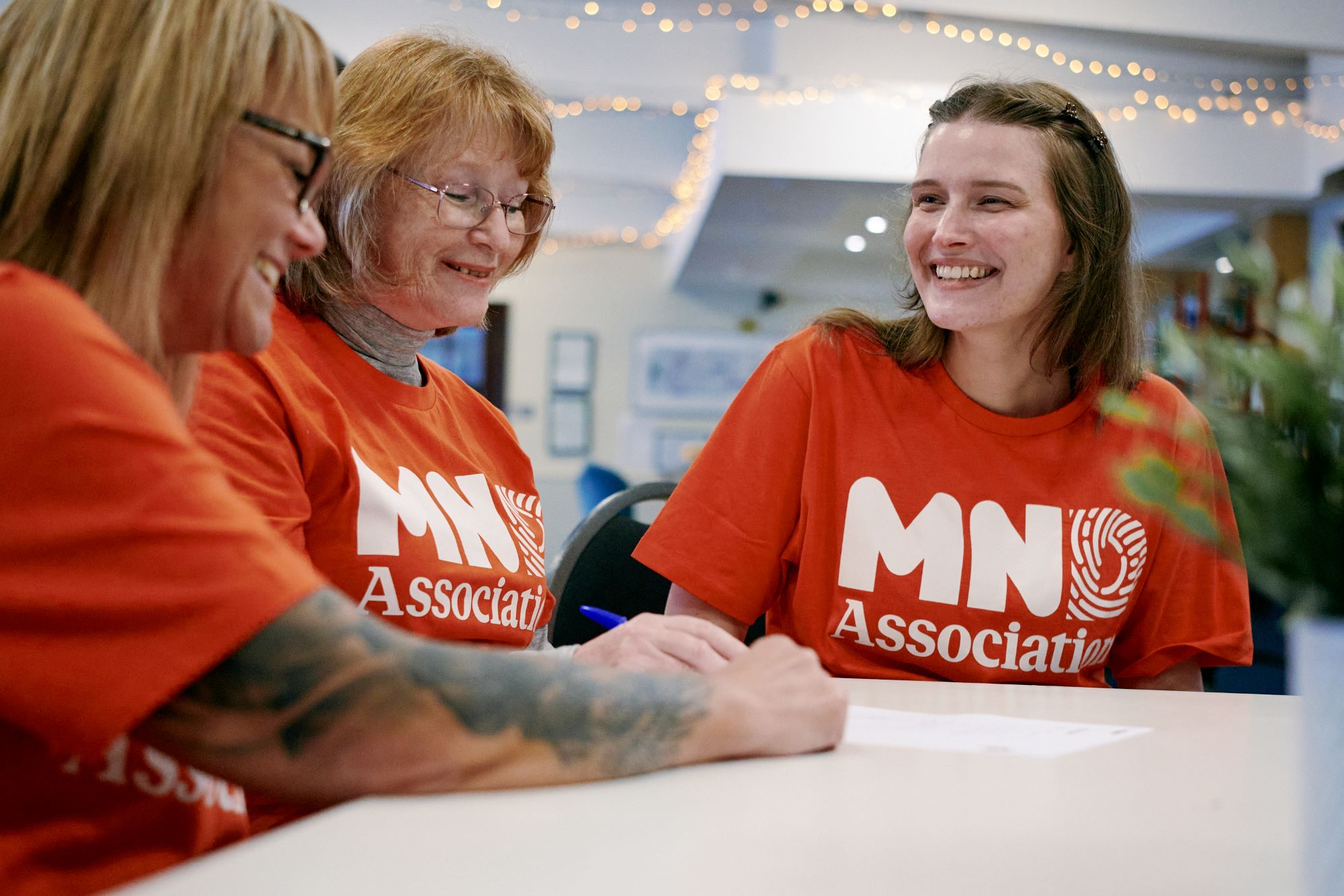 A team of people on a table.