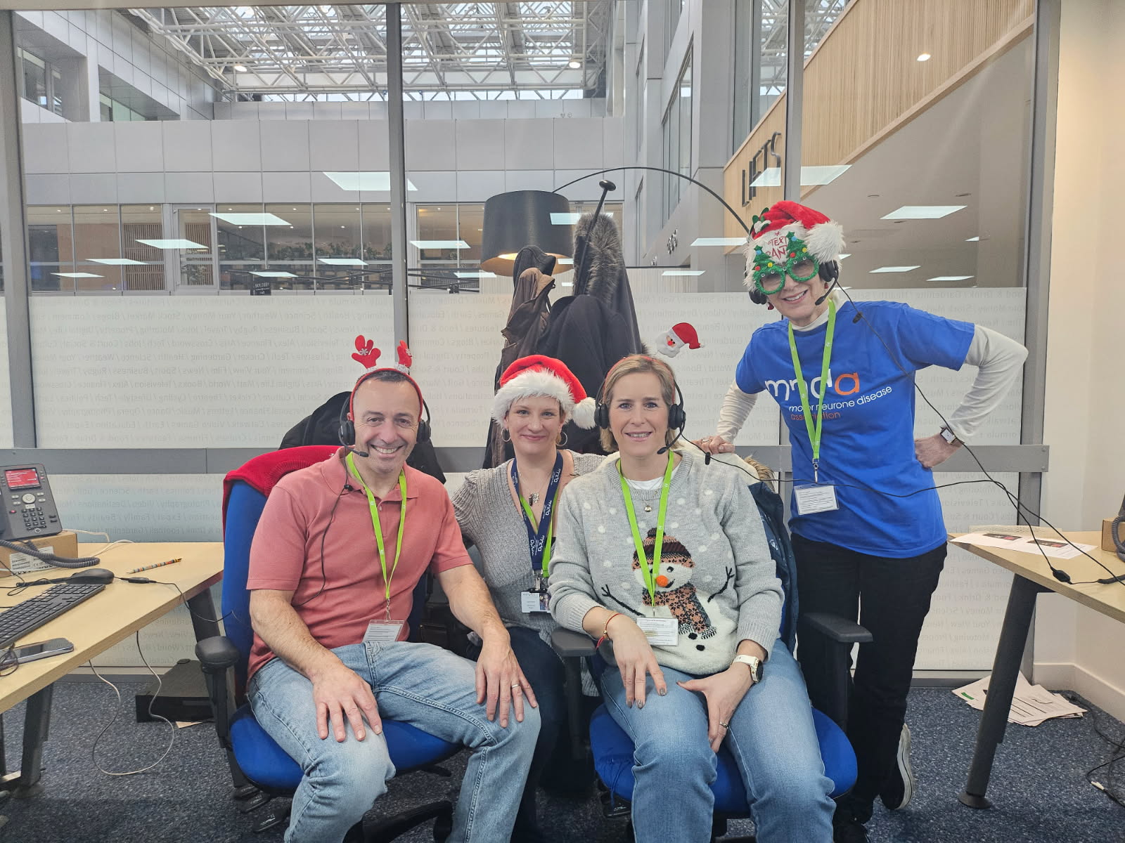 Photo of Daren and staff at the Telegraph phone-in