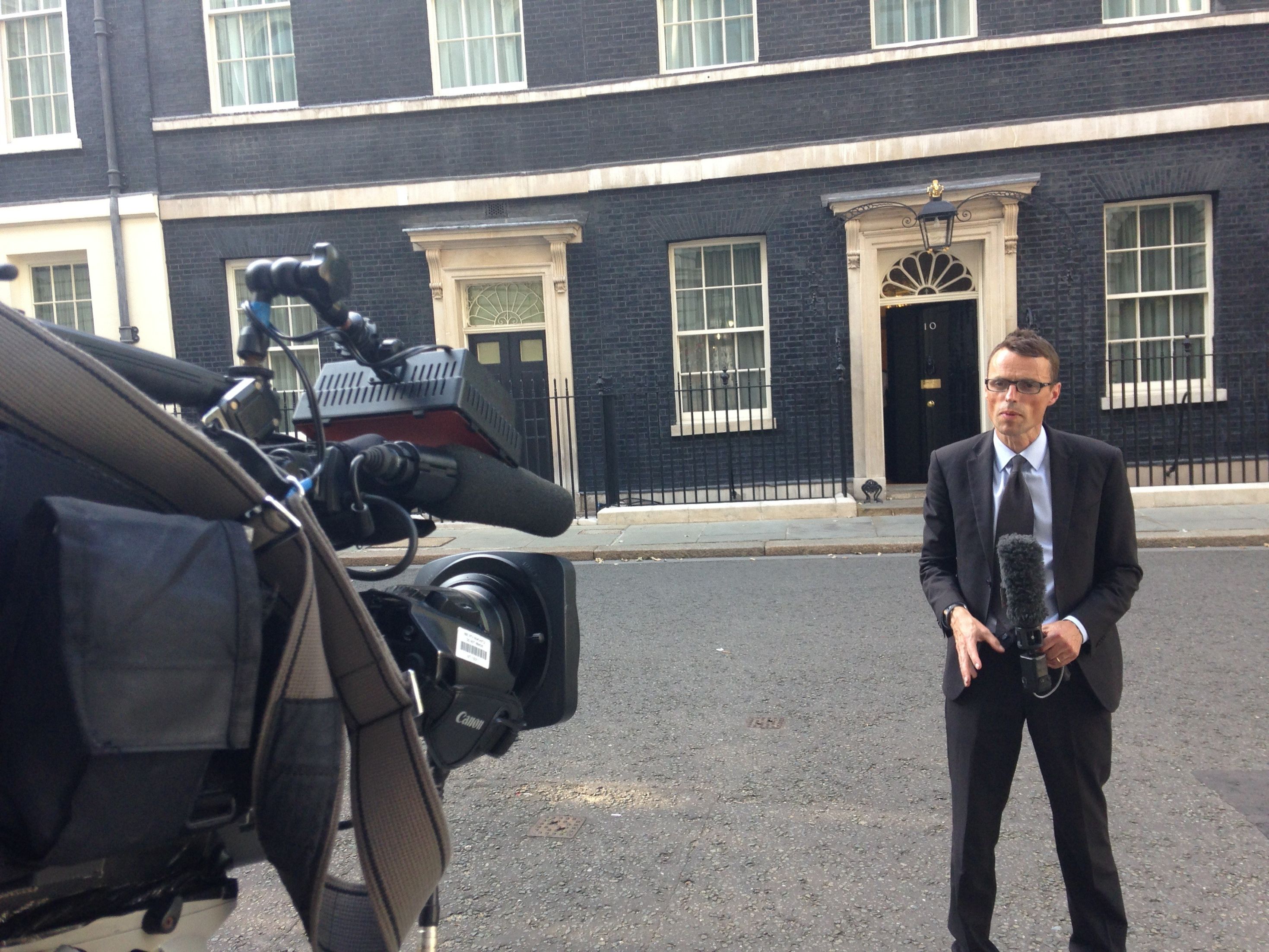 Andrew reporting in front of camera at Downing Street