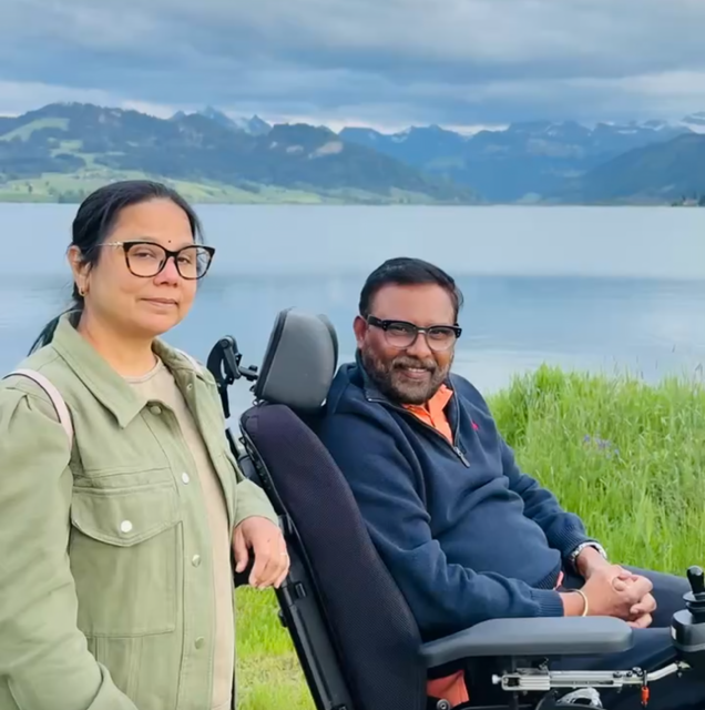Close up of Sylvia and Jay in front of mountains