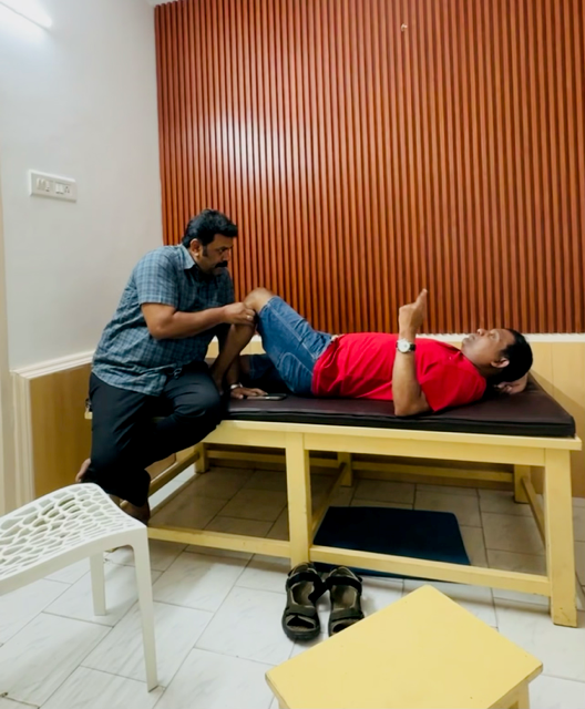 Jay receives physiotherapy