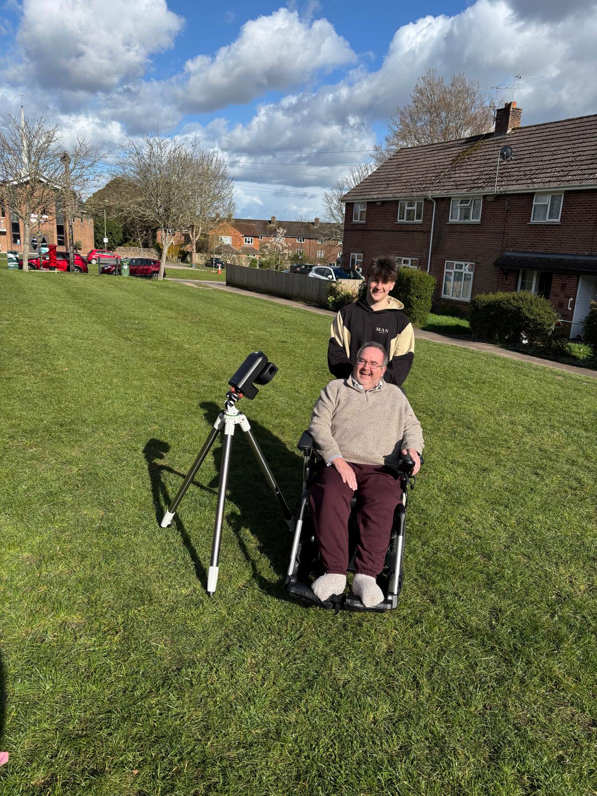 Jim and his son with the telescope