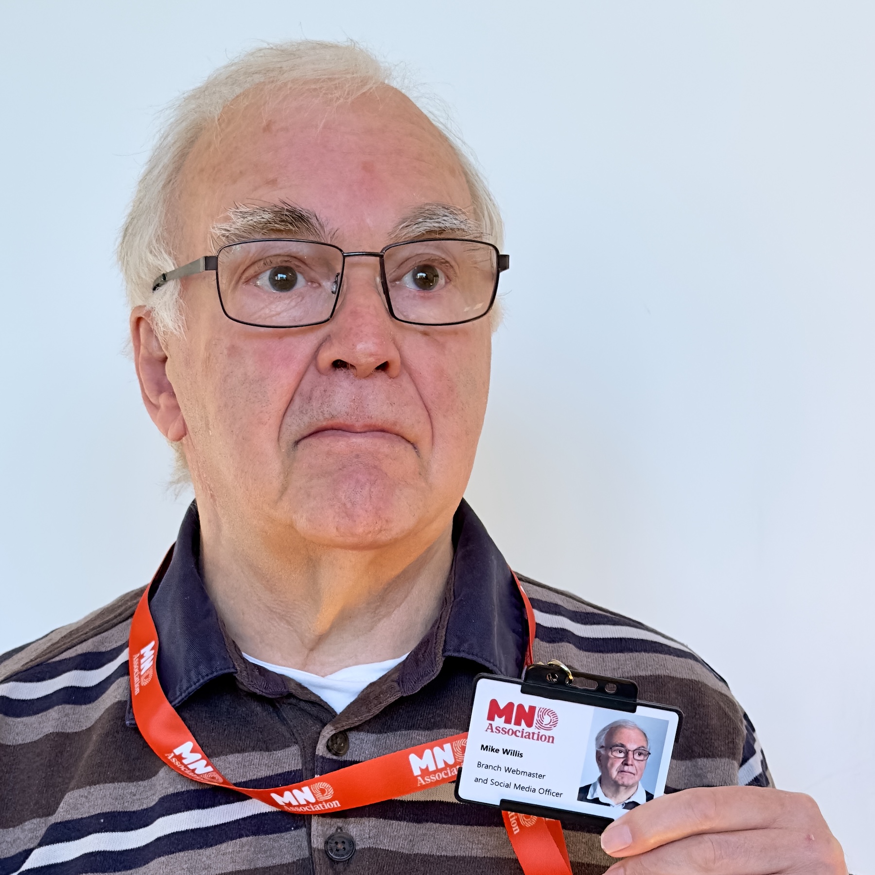 Mike with his volunteer badge