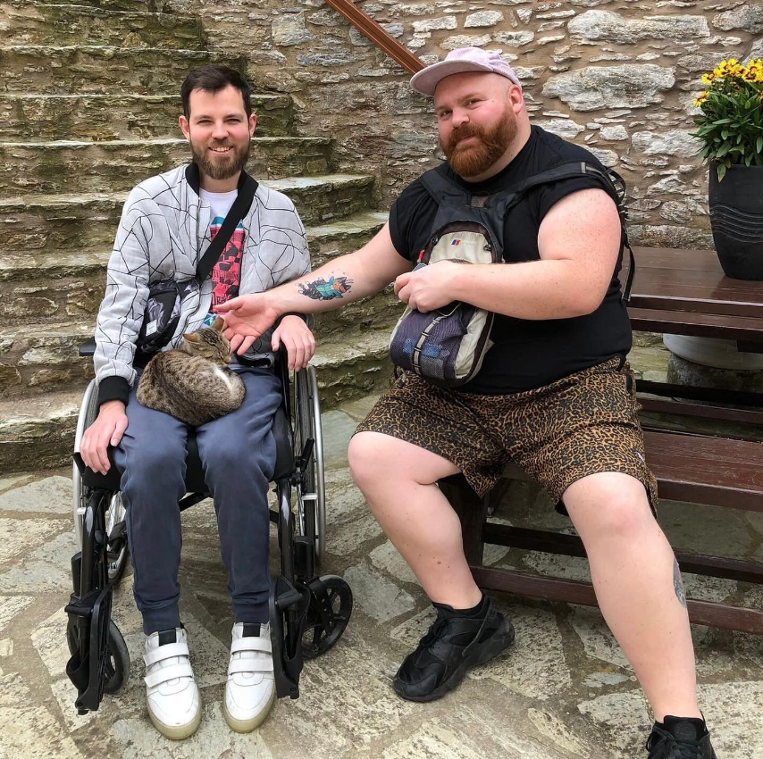 Alex and his husband Craig on holiday