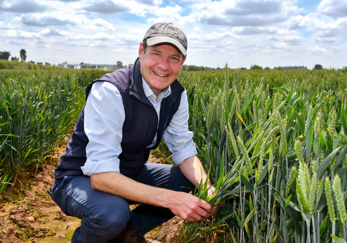 Charlie smiling in field