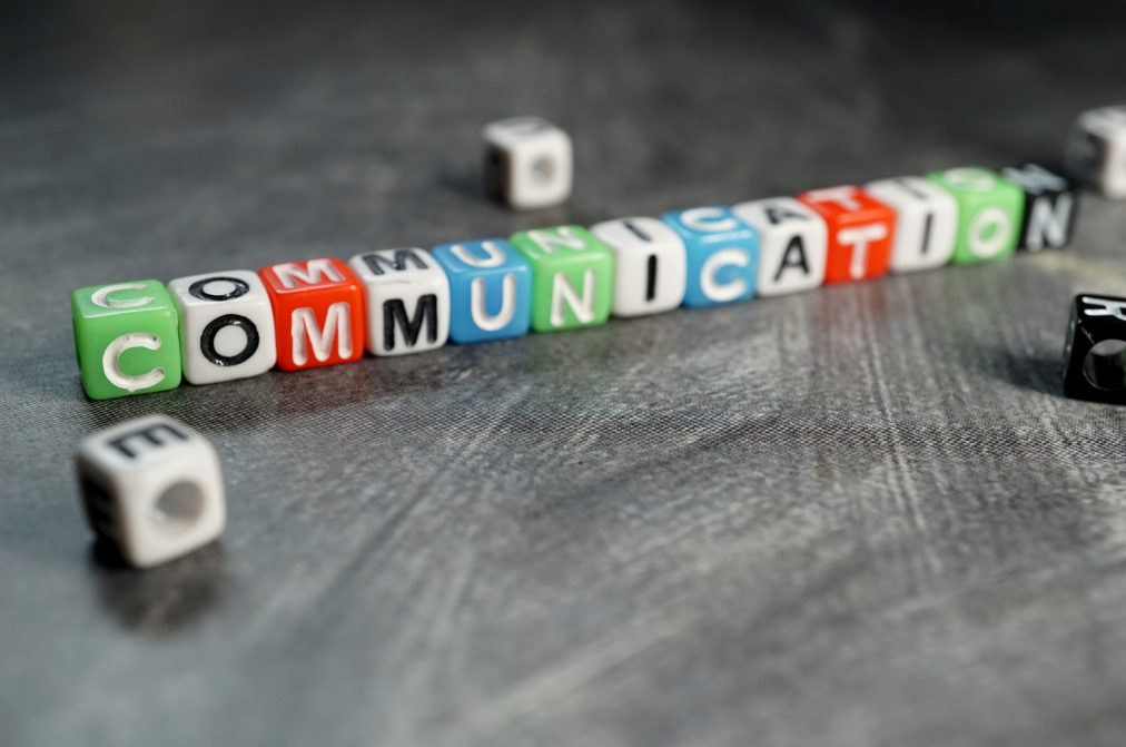Bricks spelling out the word 'communication'