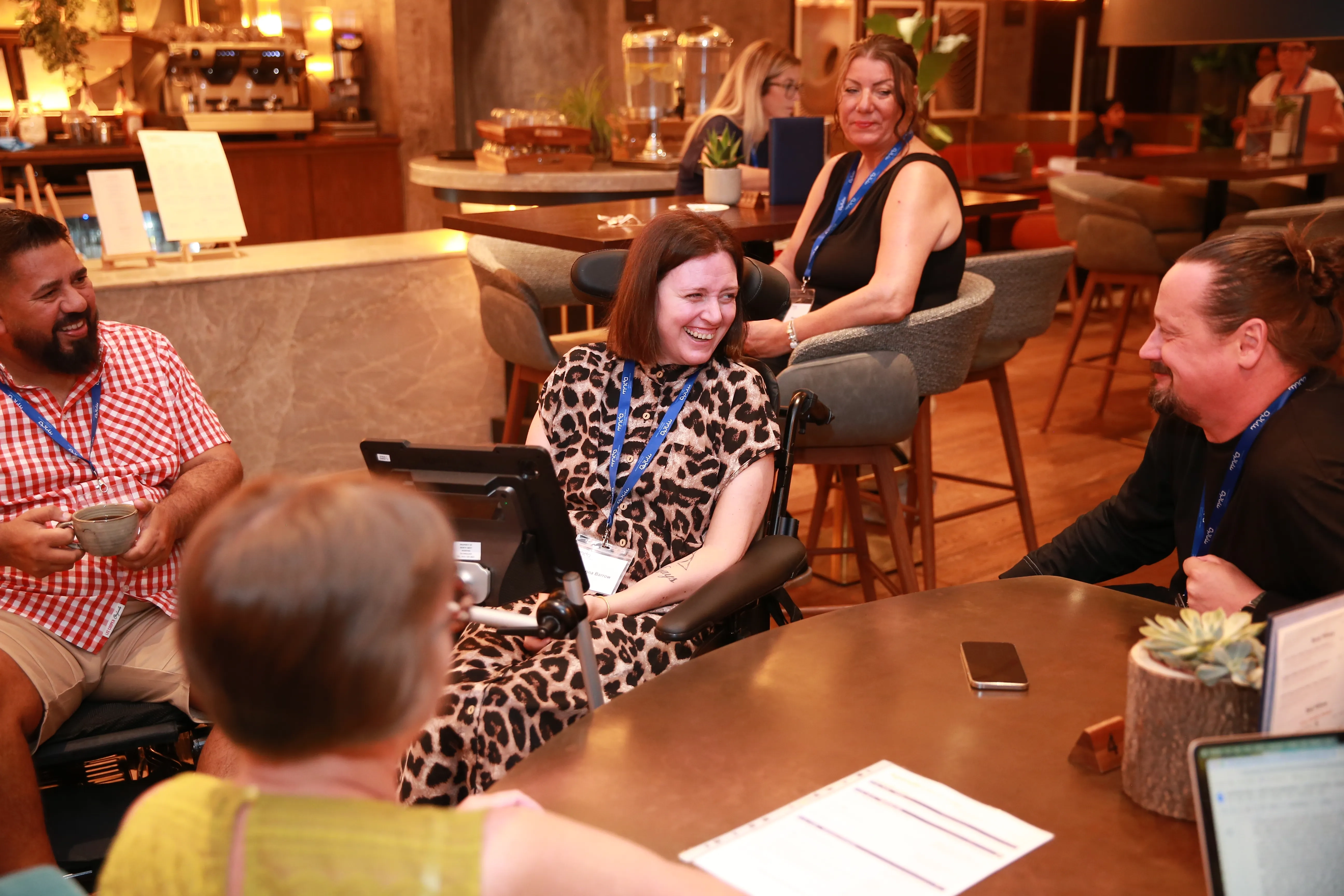 A group of people laughing. 