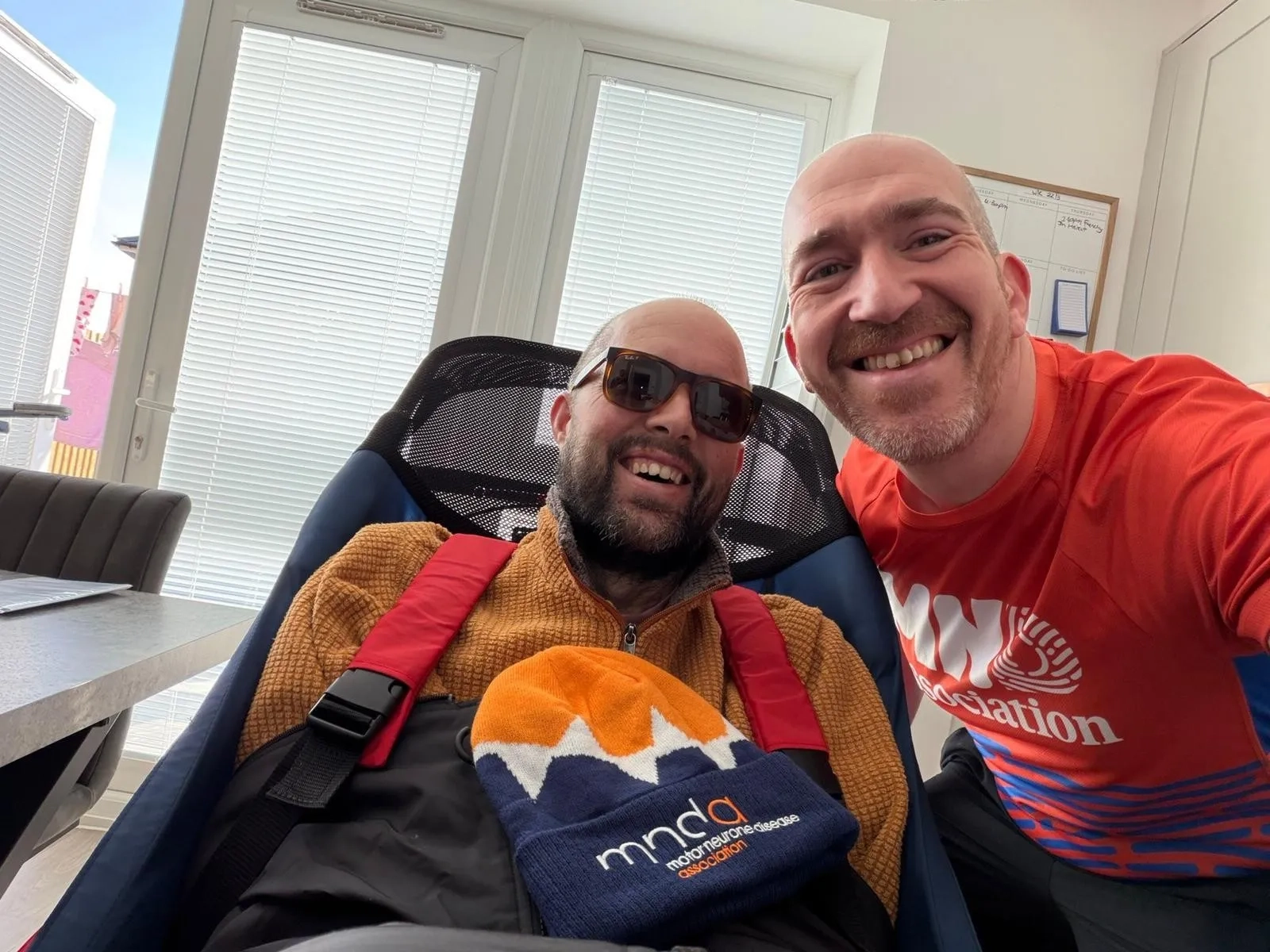 Jon Over will be pushed around the iconic London Marathon course by his former Navy colleagues