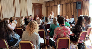 professionals attending an interactive presentation