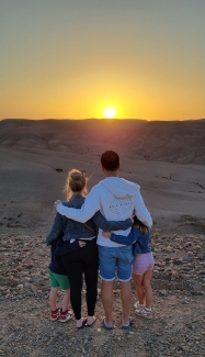 Eugene and his family look out at a sunset