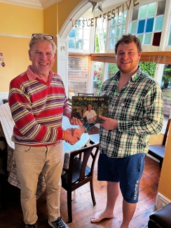 Martin with his book and son