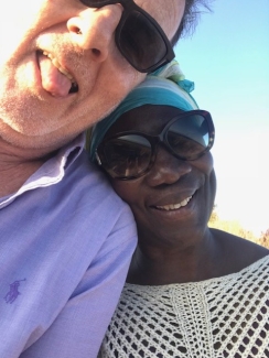 Rona and Adrian - Rona smiles, Adrian sticks out his tongue