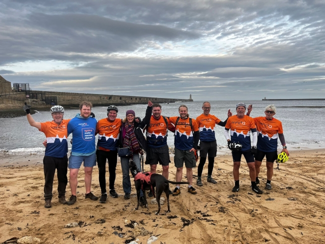 Martin with friends and family at end of coast-to-coast challenge