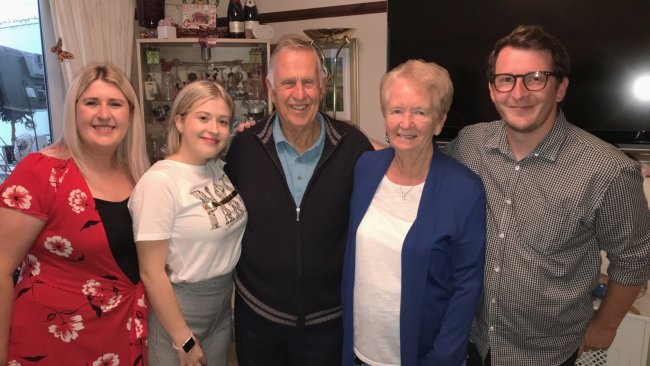 Jessica-Louise with family, her nan and grandad stand in the middle