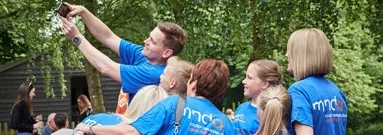 Group of volunteers taking a photo of themselves.