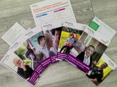 Leaflets spread out on a desk