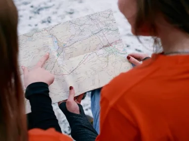 people looking at a map