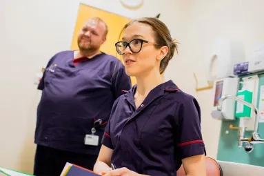 Research nurse taking notes