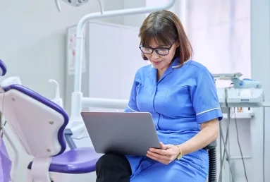 Professional using a laptop