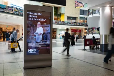 An Association billboard in a shopping centre