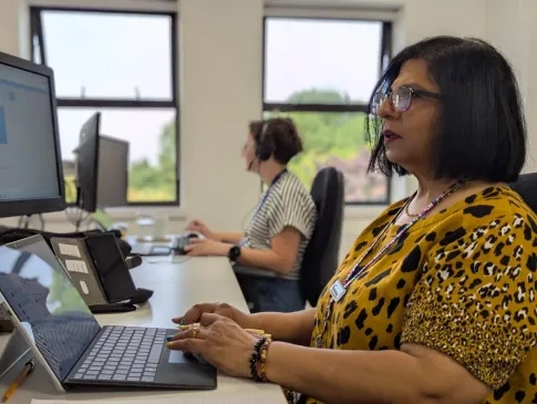 MND Connect advisers at their computers