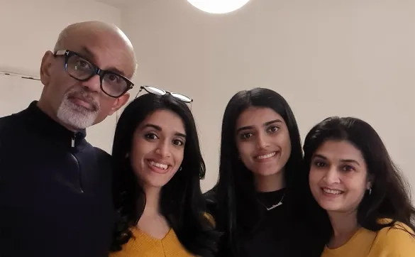 family smiling to camera